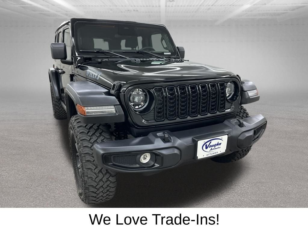 2025 Jeep Wrangler — rear three-quarter view