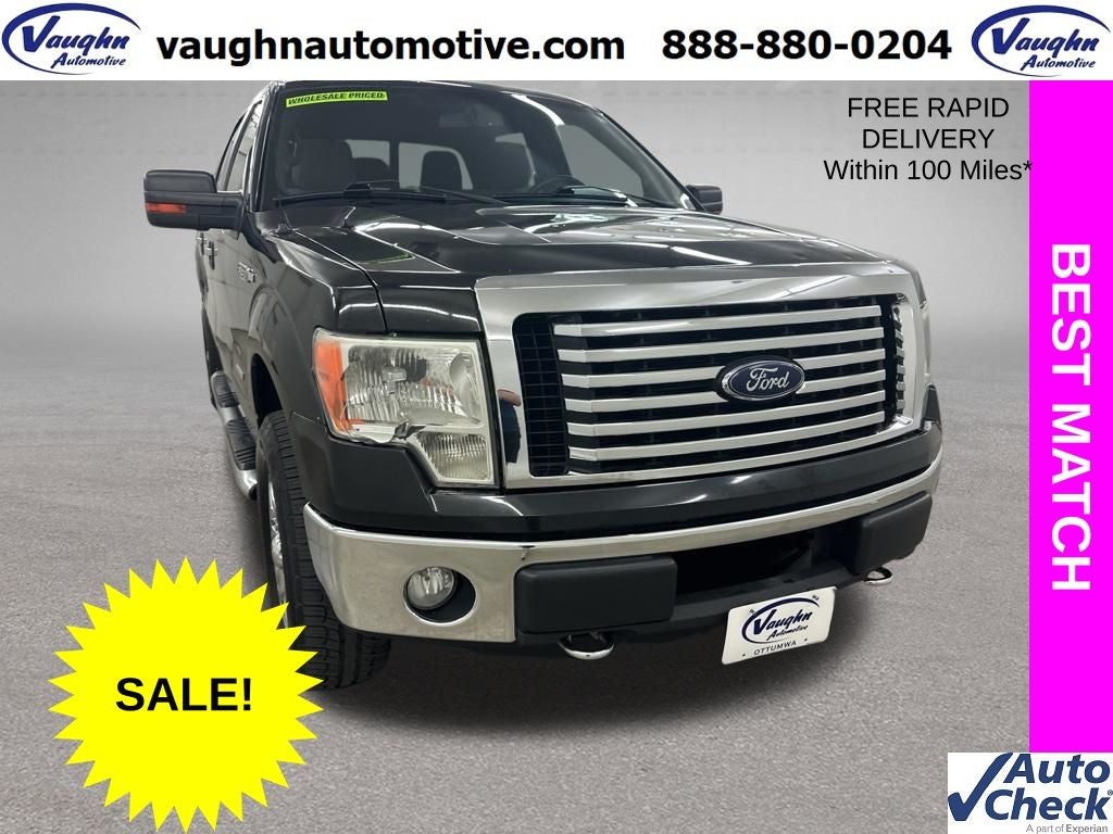 2012 Ford F-150 XLT in Tuxedo Black Metallic — front three-quarter view